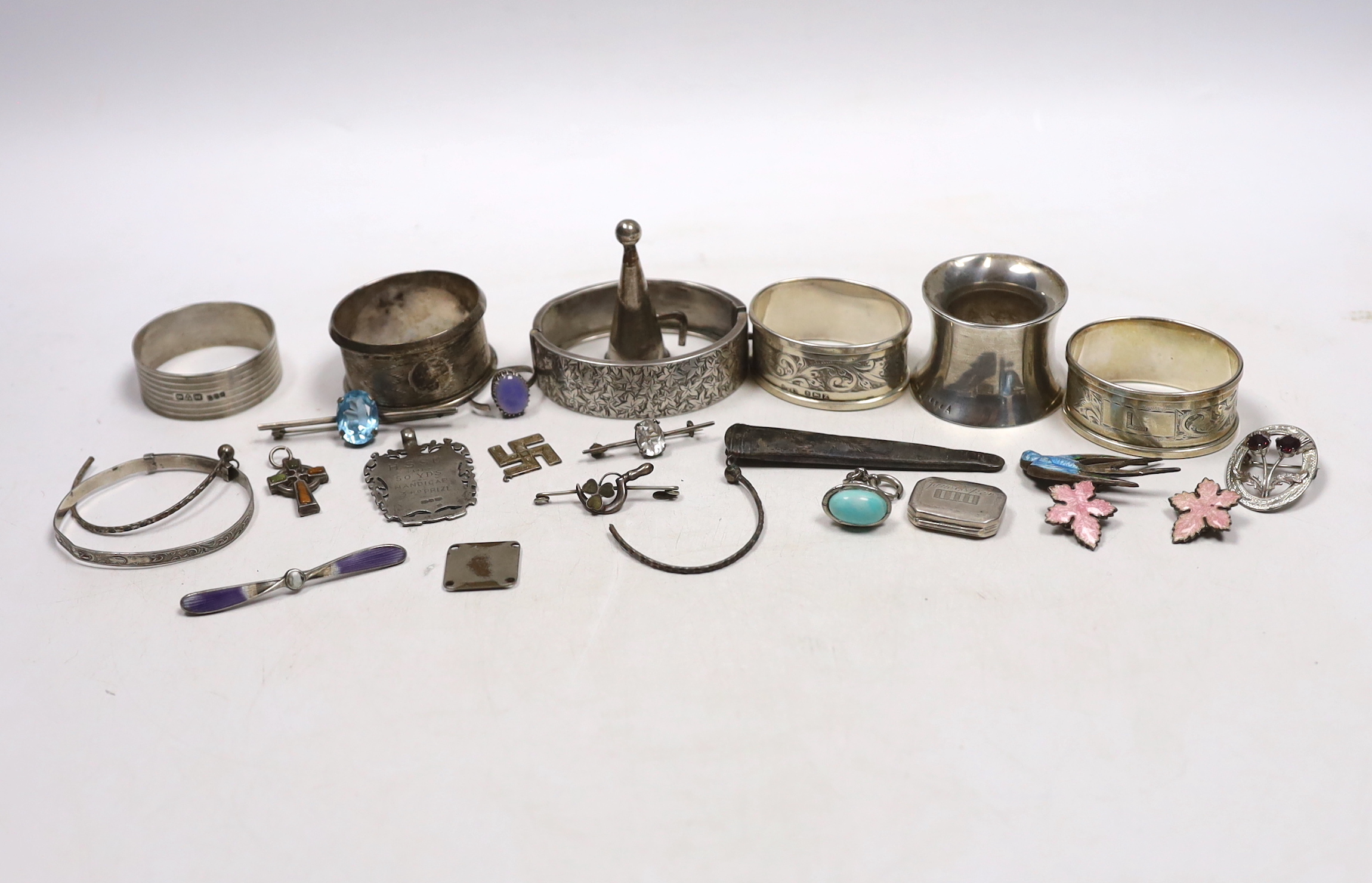 Small silver and other items including napkin rings, bracelets, 19th century vinaigrette, medals, etc.